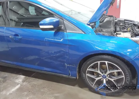 2018 Ford Focus Sel z USA, uszkodzony, nr VIN 1FADP3H28JL230749